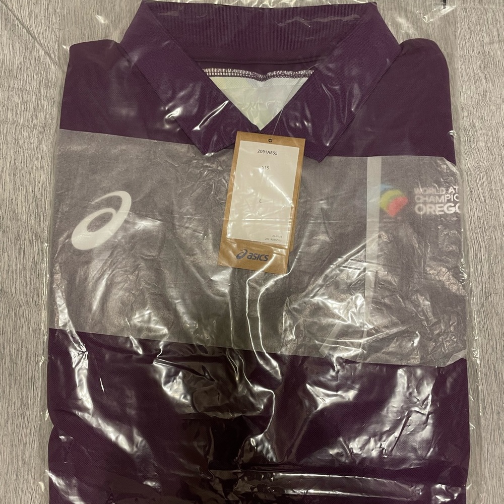ASICS world championships exclusive golf polo. Men’s medium & large